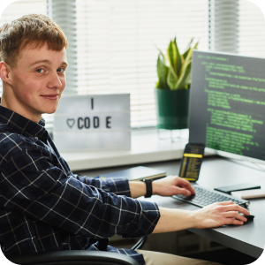 Young man smiling and working.